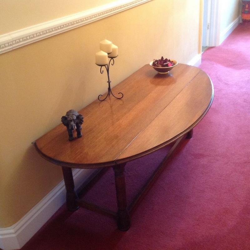 SOLID OAK OVAL COFFEE TABLE