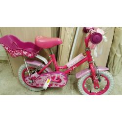 Girls first bike with stabilers