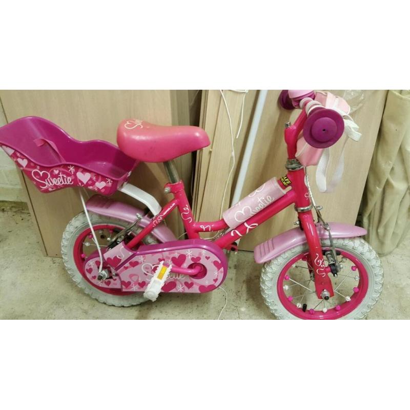 Girls first bike with stabilers