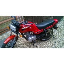 Honda cg 125cc 4 cycle sports 14k miles must be seen totally original low miles great conditon