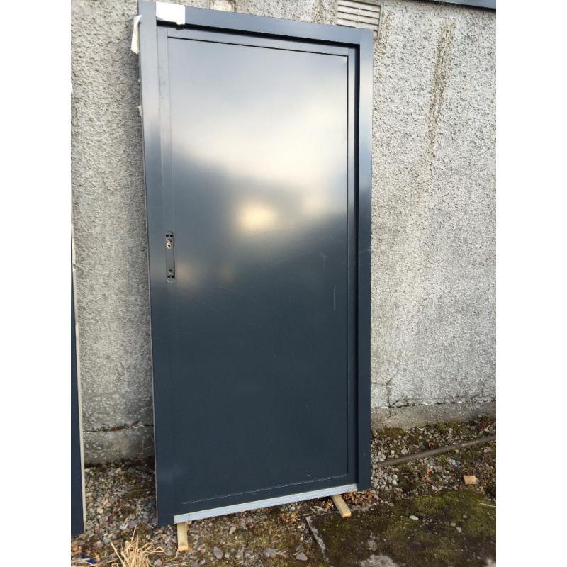 2 Nordan new doors solid with aluminium outer protection c/w frames and locks