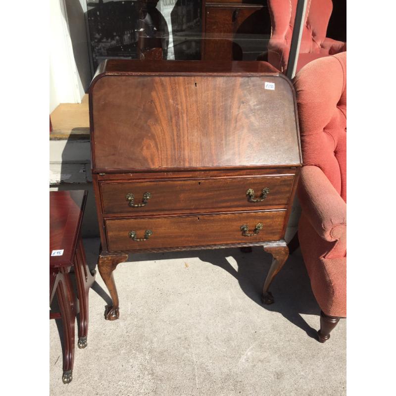 Vintage Bureau , with ball and claw feet , leather insert .