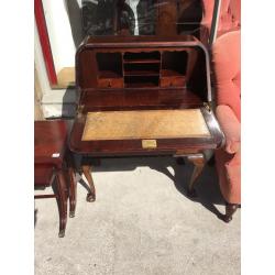 Vintage Bureau , with ball and claw feet , leather insert .