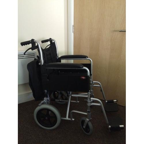 Aluminium lightweight Enigma wheelchair - used a handful of times in new condition