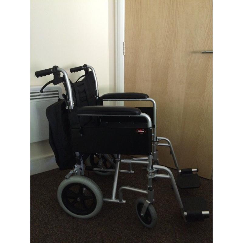 Aluminium lightweight Enigma wheelchair - used a handful of times in new condition