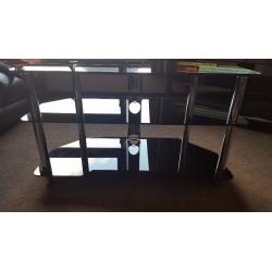 Dark Glass And Chrome Corner TV Stand.