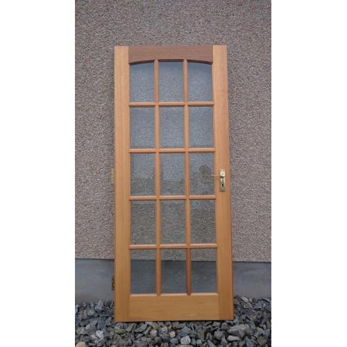Glass panelled solid wood internal door