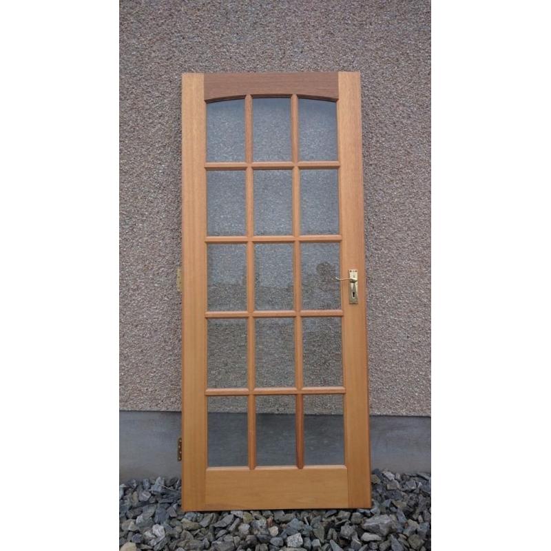 Glass panelled solid wood internal door