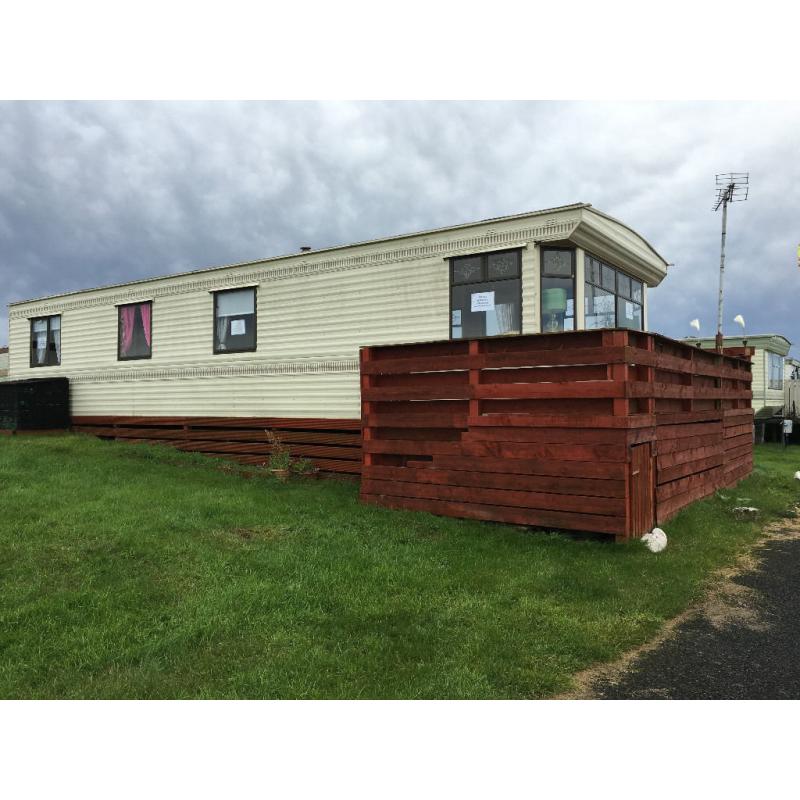 3 bed static van immaculate 37ft long with large decking, extension and garden area.