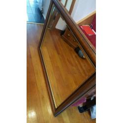 Dark wooden decorative mirror