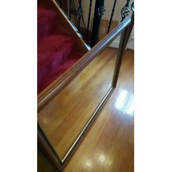 Dark wooden decorative mirror