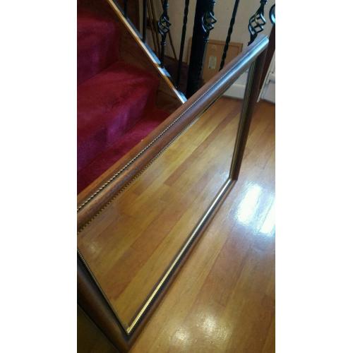Dark wooden decorative mirror