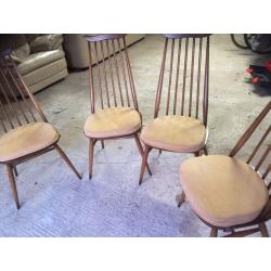 Ercol ding room table and four chairs. Excellent condition.