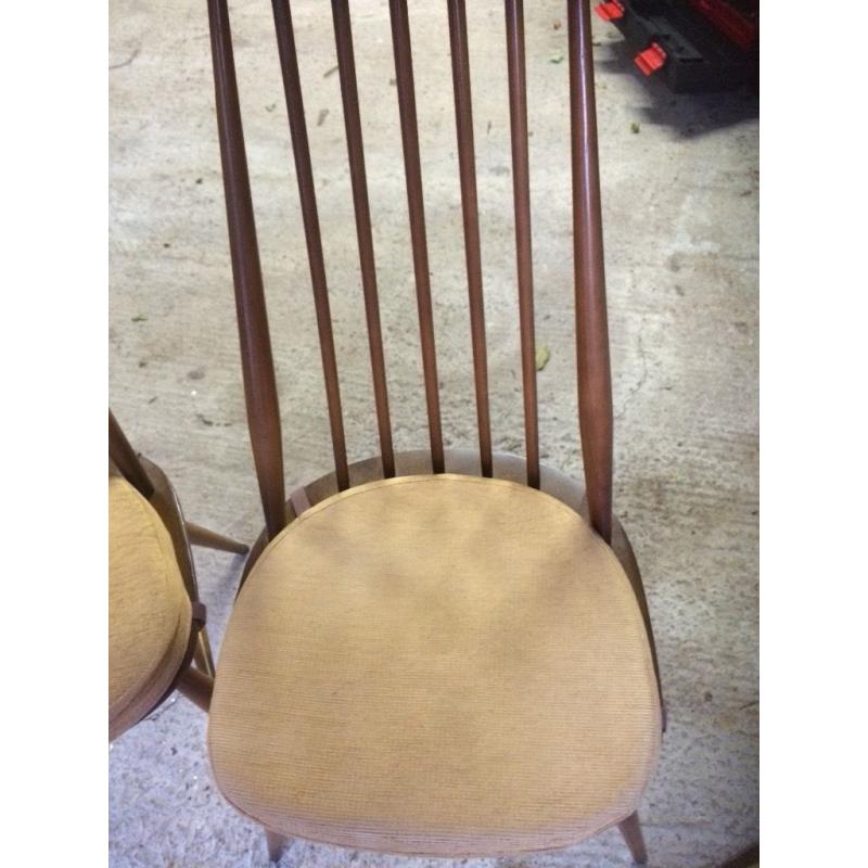 Ercol ding room table and four chairs. Excellent condition.