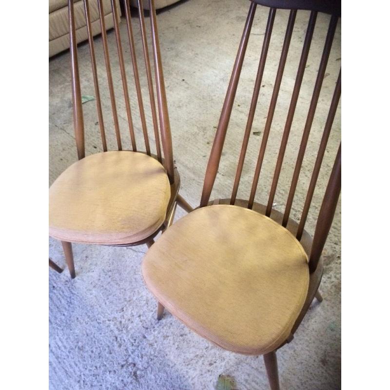 Ercol ding room table and four chairs. Excellent condition.