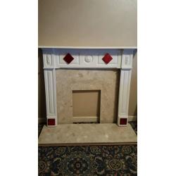 Marble Cream back Panel and Hearth with beautiful White Fire Surround with Red Tile Feature