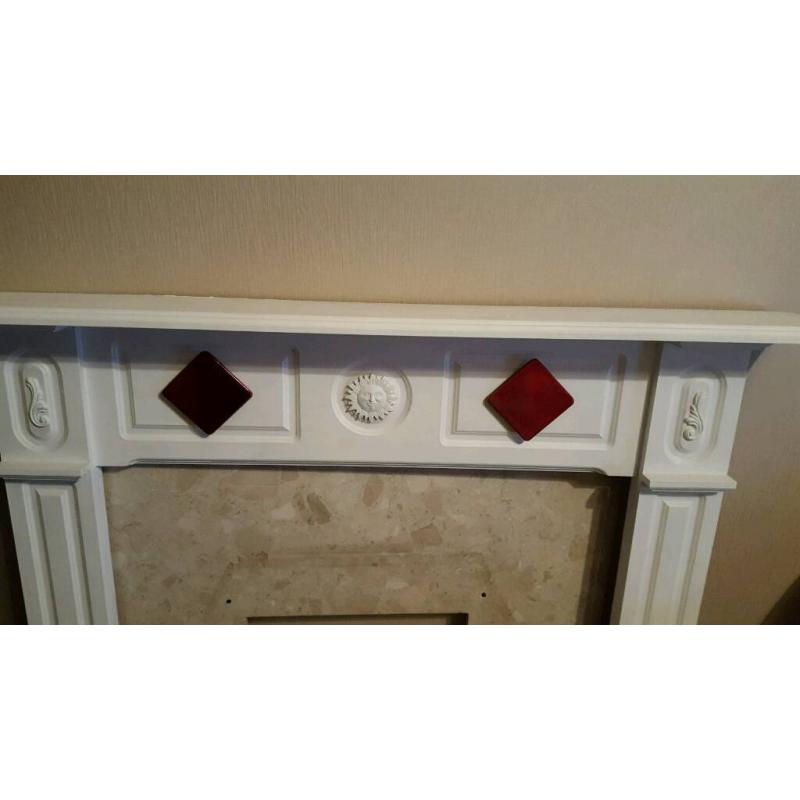 Marble Cream back Panel and Hearth with beautiful White Fire Surround with Red Tile Feature