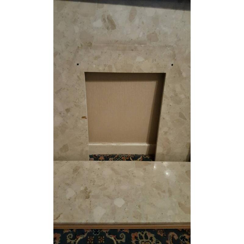 Marble Cream back Panel and Hearth with beautiful White Fire Surround with Red Tile Feature