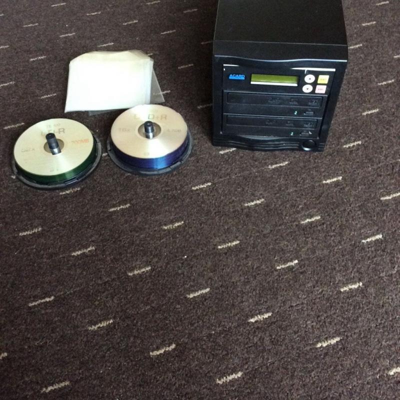 Acard cd/DVDs copier comes with blank CDs and DVDs and wallets