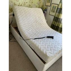 Adjustable bed with massage