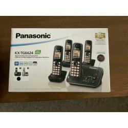 Panasonic quad home phones with answer machine.