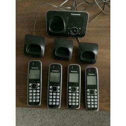 Panasonic quad home phones with answer machine.