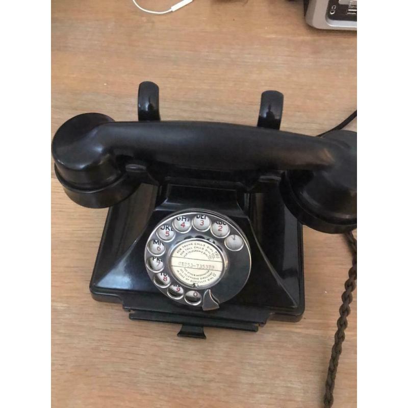 Black 1950s phone with G EC ext bell