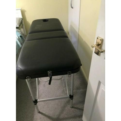 Massage table