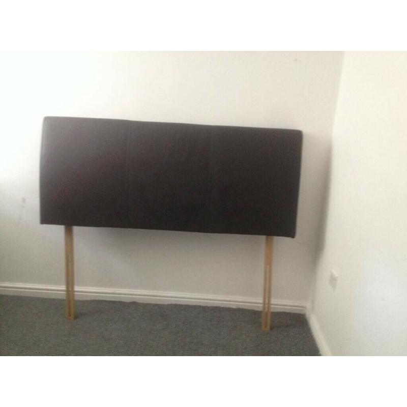 Excellent condition king size dark brown leather headboard.