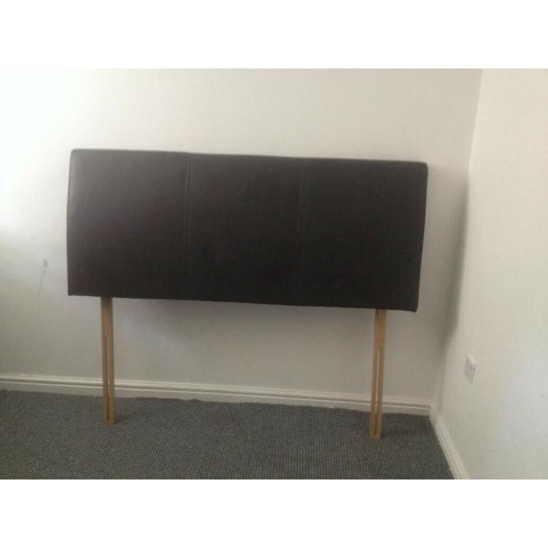 Excellent condition king size dark brown leather headboard.
