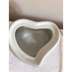 Tea light candle holder with cut out stars