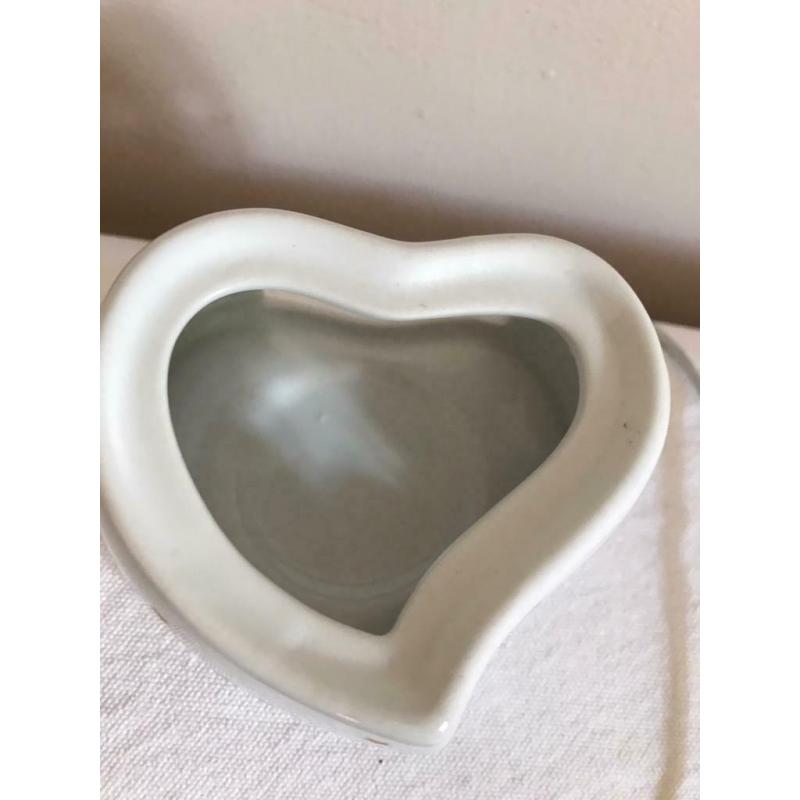 Tea light candle holder with cut out stars