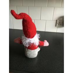A HAND KNITTED CHRISTMAS GNOME