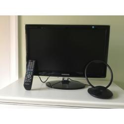 Samsung P2270HD on stand with remote control and aerial