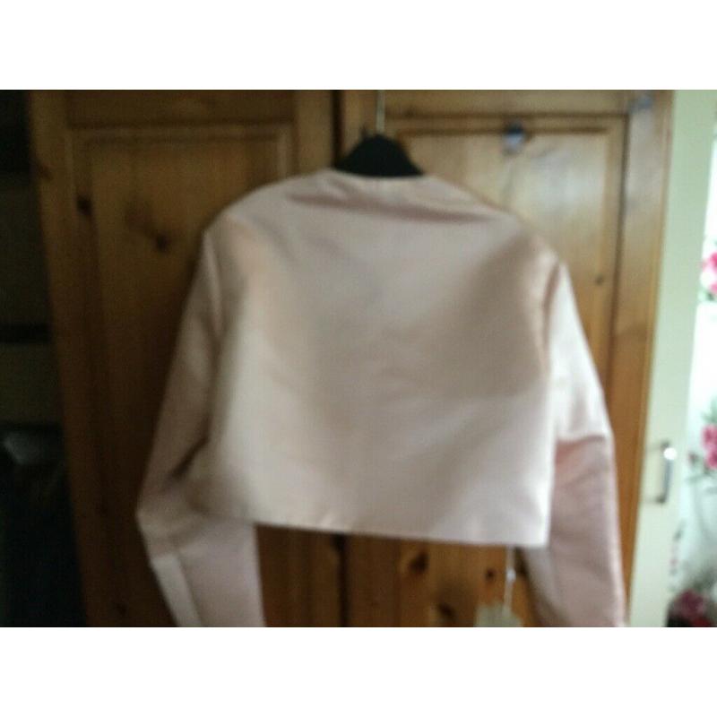 Beautiful pearl wrap size 18.Brand new with tags