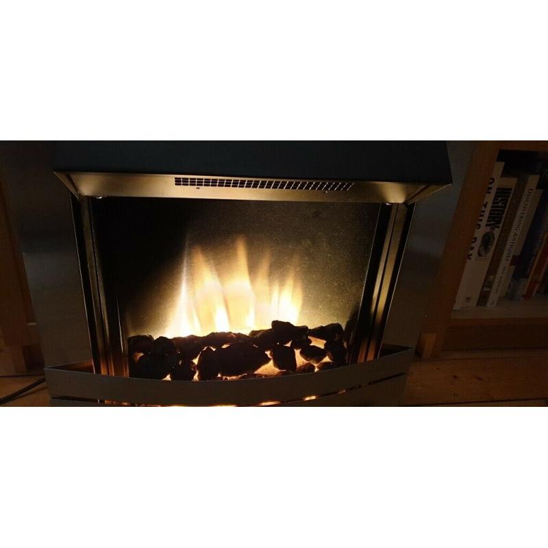 FIREGLO 2000W ELECTRIC FIRE WITH 2 HEAT SETTINGS AND ALSO WITH OR WITHOUT FAN.