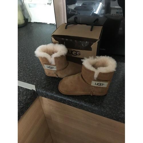 Baby girl ugg boots size 4