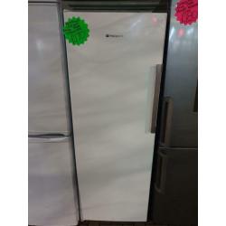 White upright Hotpoint freezer