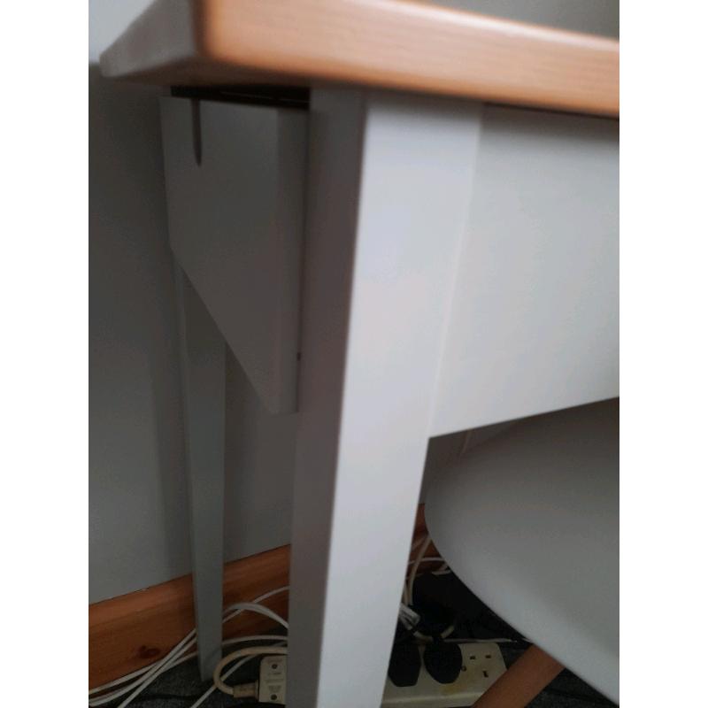 grey desk with wooden top