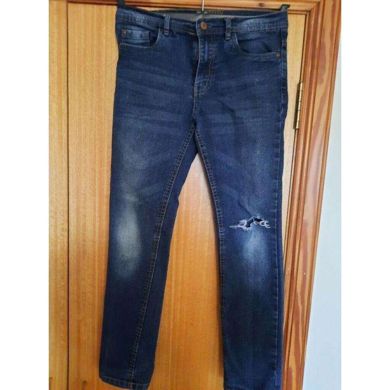 Various pairs of kids jeans