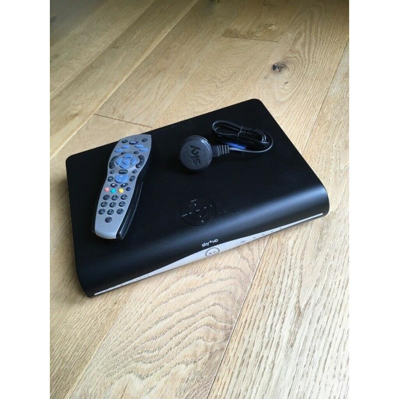 Sky satellite box with remote control and power cable