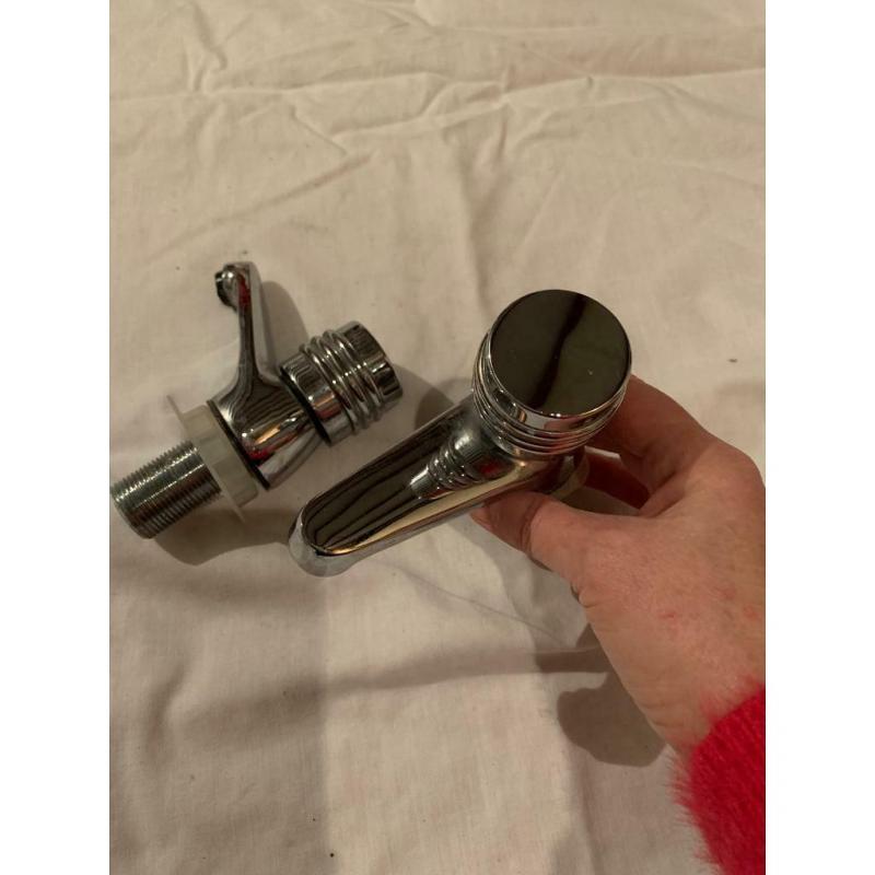 Chrome bath taps