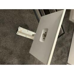 white strong metal wall/shelf bracket for TV or microwave etc... was used for old style portable