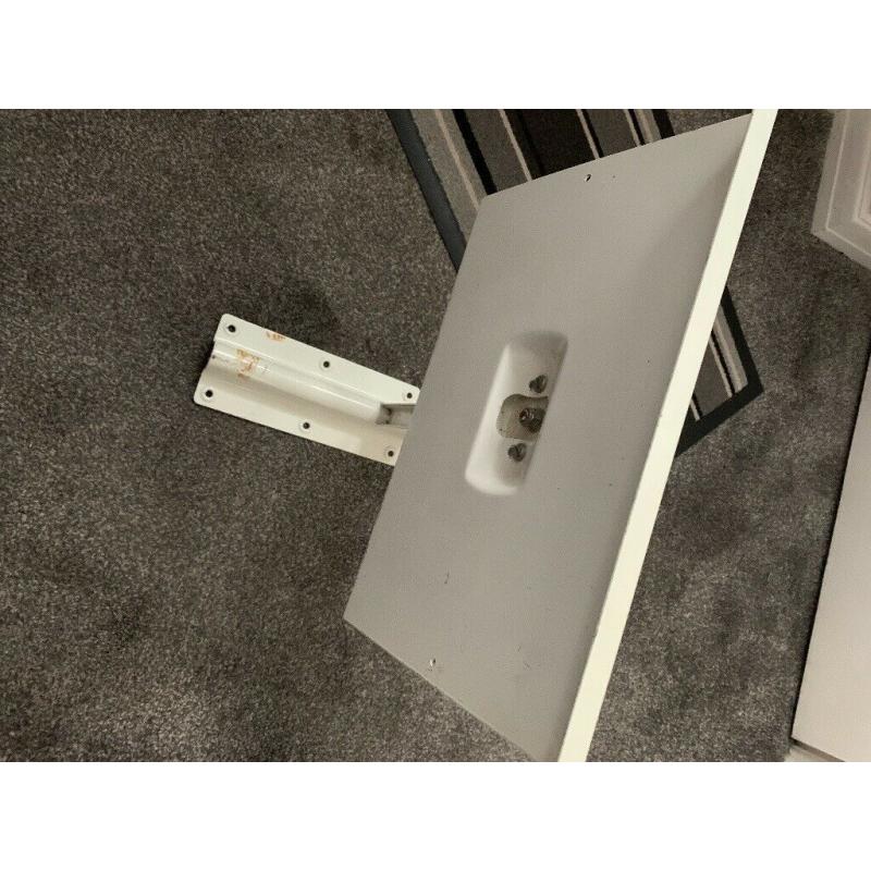 white strong metal wall/shelf bracket for TV or microwave etc... was used for old style portable
