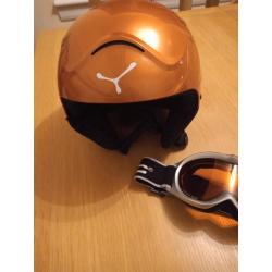 Child's snow helmet and goggles