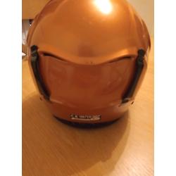 Child's snow helmet and goggles