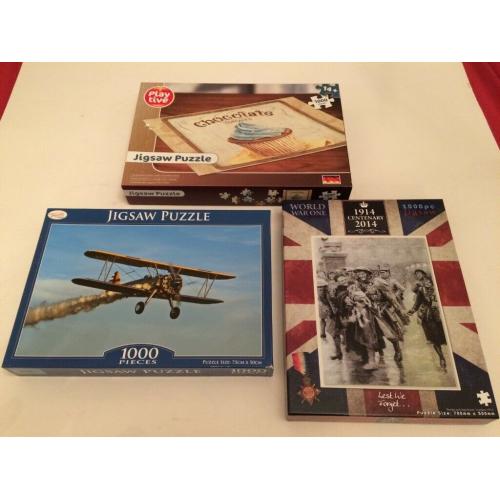 Two, Jigsaws, One New. 1,000 Pieces. good condition.