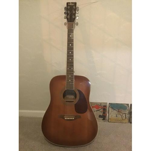 Acoustic guitar, solid spruce top.