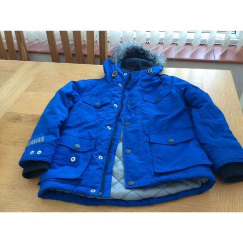 Child?s blue Next anorak age 7