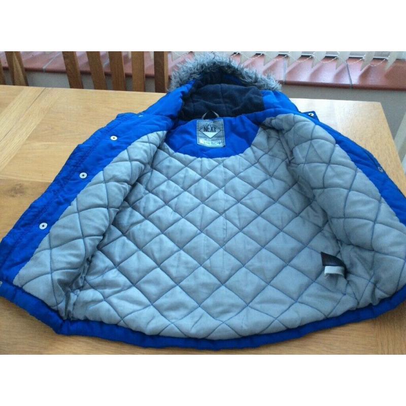 Child?s blue Next anorak age 7
